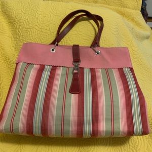 Longchamp fabric tote with leather handles and closure strap
